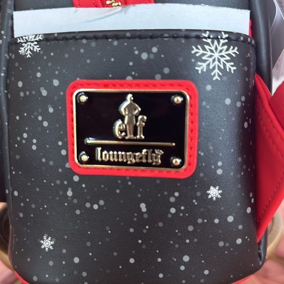 🧝SMILING’S MY FAVORITE ELF LOUNGFLY🧝 - Picture 3 of 6